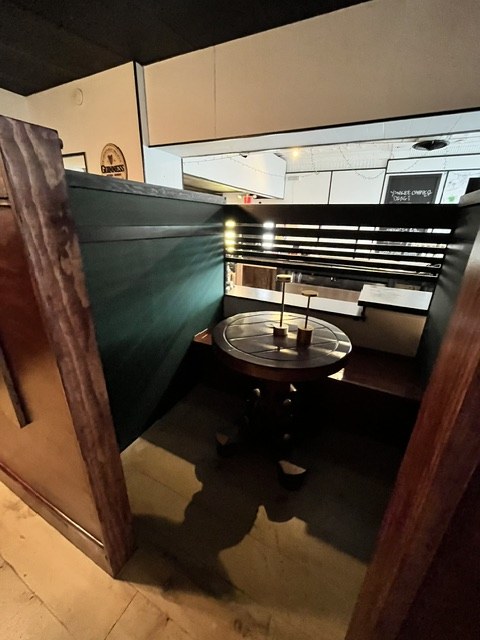 Table and lamp set in the booth