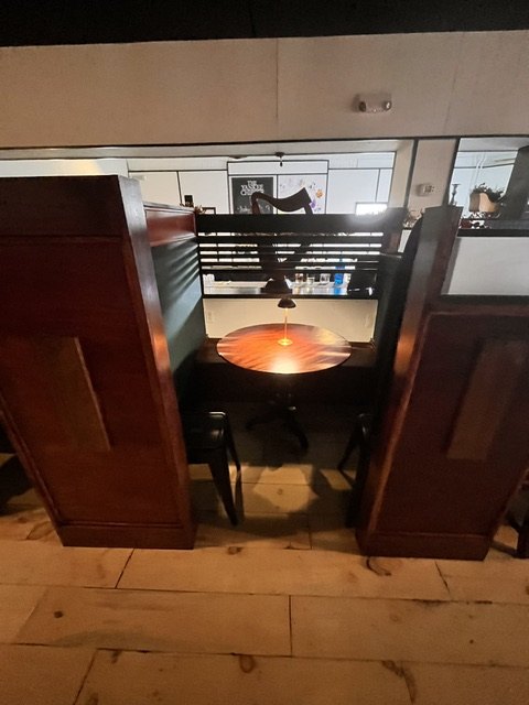 Booth partitions with a lamp between them