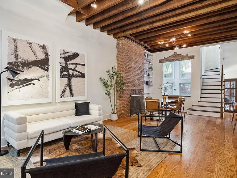 Brick wall and black stair