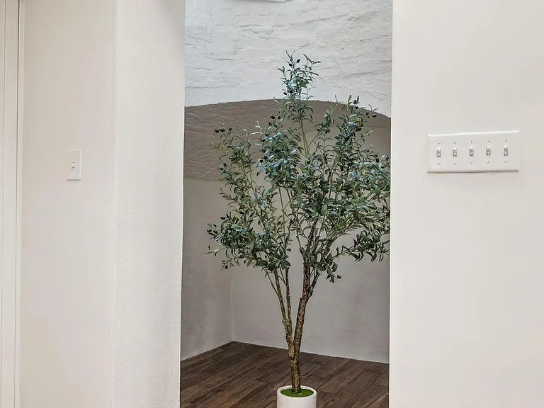 Arched alcove in painted brick