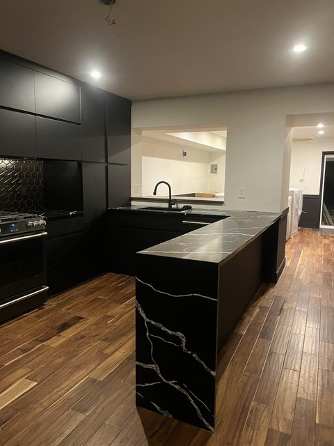 Waterfall edge on a black stone island