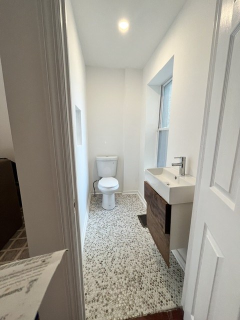 Terrazzo floor in a small bath
