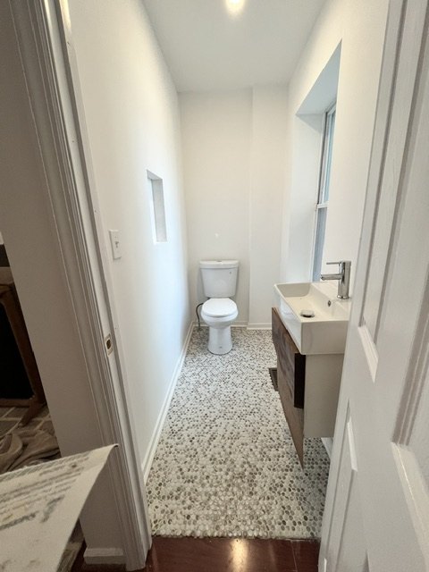 Bath with a terrazzo floor