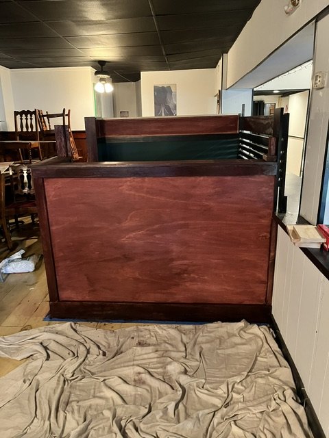 Booth backs with the floor still covered
