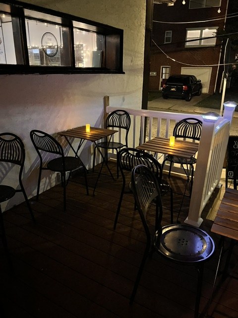 Striped wall and cafe chairs